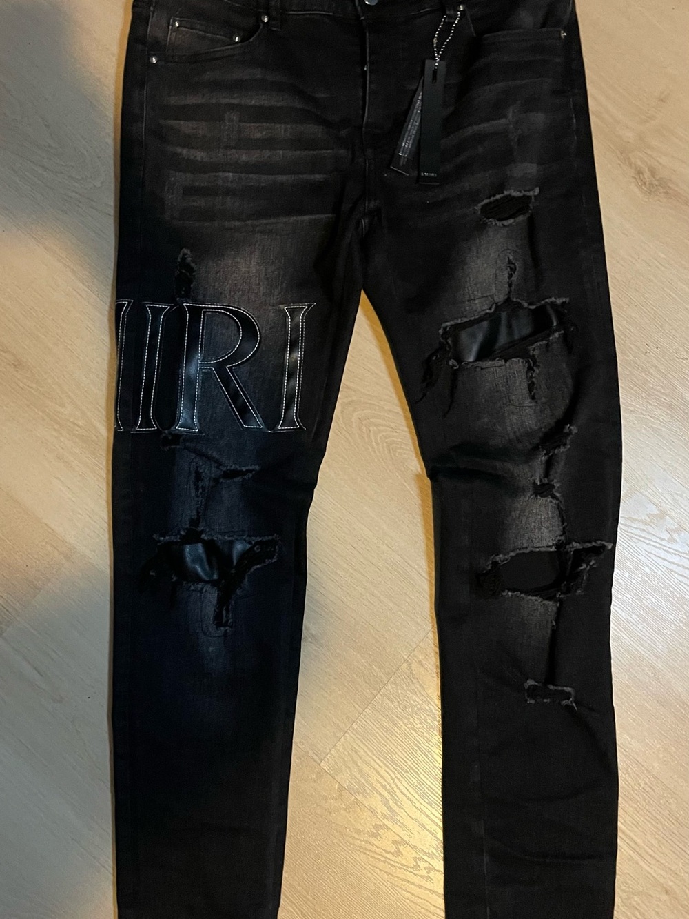 Amiri Black Distressed Men's Jeans with Embroidered Lettering